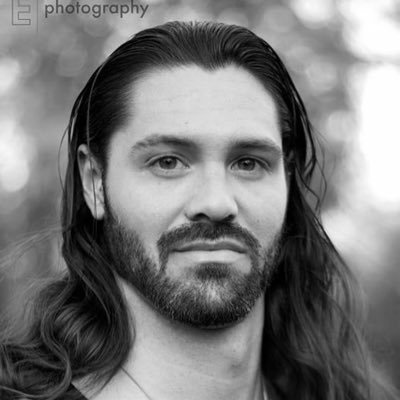 Alexander Cortes portrait in black and white, long hair