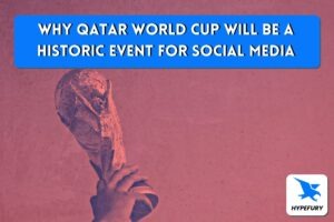 the physical World Cup is hoisted under a banner about social media in Qatar World Cup